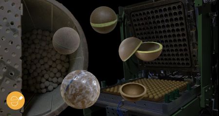 Avec de la colle spéciale appliquée, deux demi-coquilles se fusionnent dans une machine hydraulique.